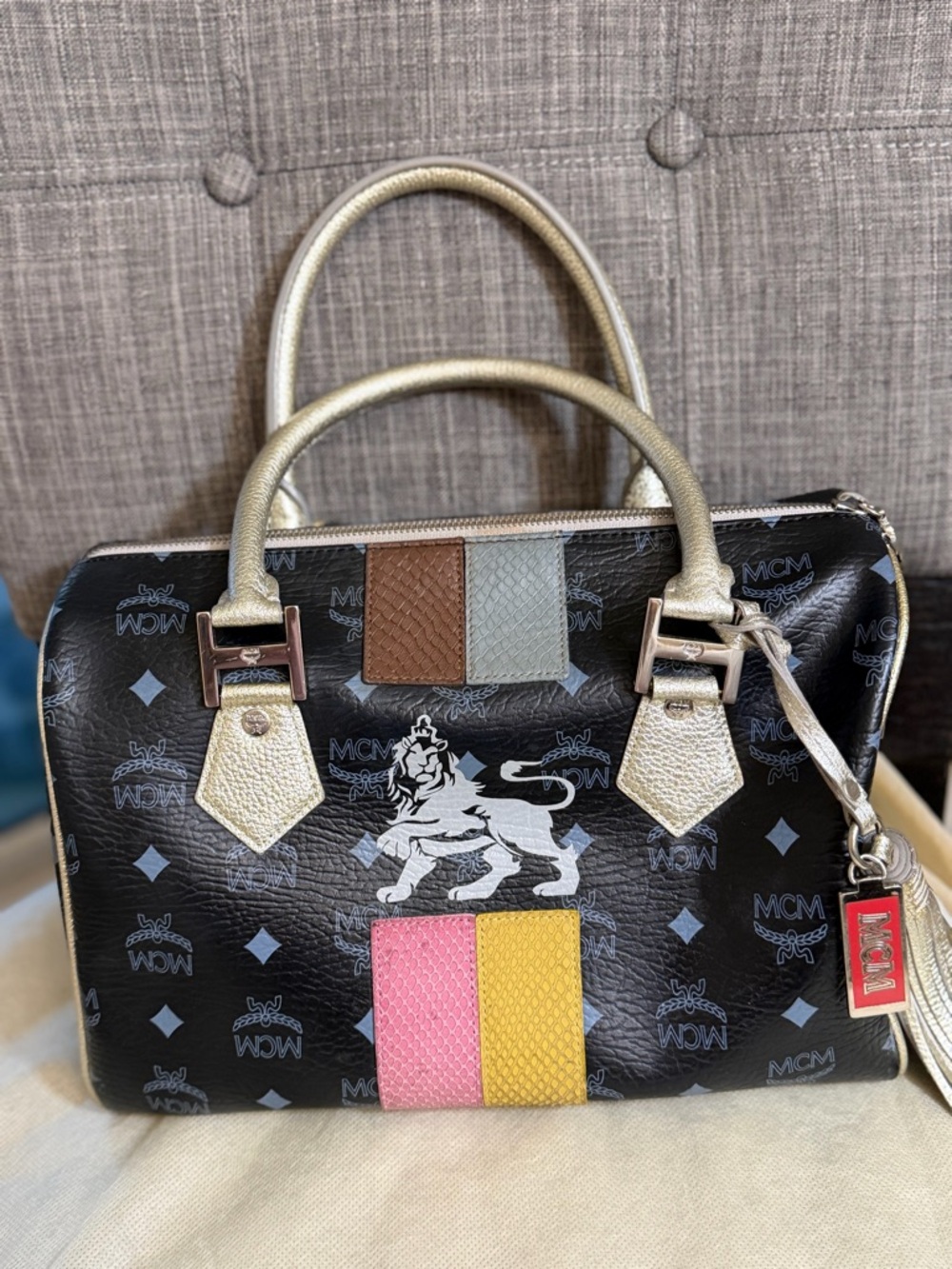 MCM Black Visetos Satchel with Pink & Yellow Front Panels and Gold Handles